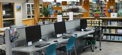 A row of computers on desks at Guinn Library at Hatfield Marine Science Center